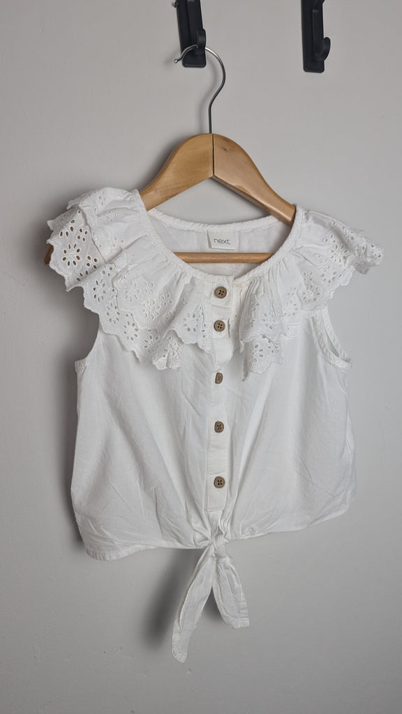 Next White Eyelet Sleeveless Top - Girls 4 Years Little Ones Preloved Used, Preloved, Preworn & Second Hand Baby, Kids & Children's Clothing UK Online. Cheap affordable. Brands including Next, Joules, Nutmeg Morrisons, TU, F&F, H&M.