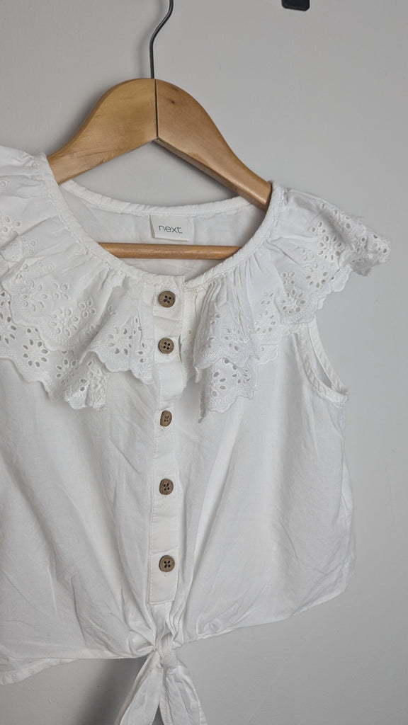 Next White Eyelet Sleeveless Top - Girls 4 Years Little Ones Preloved Used, Preloved, Preworn & Second Hand Baby, Kids & Children's Clothing UK Online. Cheap affordable. Brands including Next, Joules, Nutmeg Morrisons, TU, F&F, H&M.