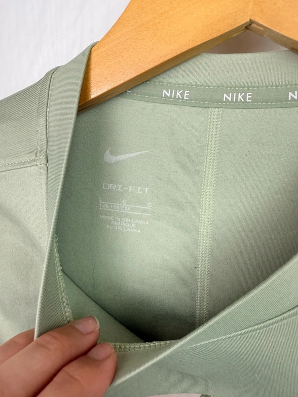 Nike Dri - Fit Light Green Long Sleeve Sports Top - Girls 11 - 12 Years - Little Ones Preloved. Second Hand Children's & Preloved Baby, Kids, Girls & Boys Clothes. UK online