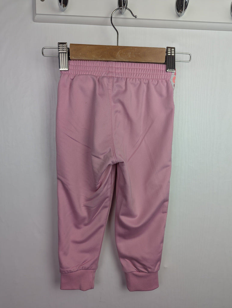 Nike Pink Tracksuit Sport Bottoms - Girls 18 Months Little Ones Preloved Used, Preloved, Preworn Baby, Girls & Boys Clothes. Kids & Children's second hand Clothing UK Online. Cheap affordable. Brands including Next, Joules, Nutmeg Morrisons, TU, F&F, H&M.