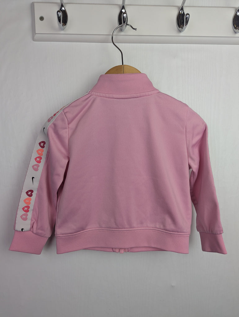 Nike Pink Tracksuit Zip Jumper - Girls 18 Months Little Ones Preloved Used, Preloved, Preworn Baby, Girls & Boys Clothes. Kids & Children's second hand Clothing UK Online. Cheap affordable. Brands including Next, Joules, Nutmeg Morrisons, TU, F&F, H&M.