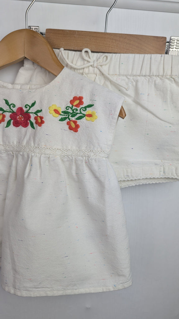 Nutmeg Cream & Multicolour Floral Outfit - Girls 12-18 Months Little Ones Preloved Used, Preloved, Preworn & Second Hand Baby, Kids & Children's Clothing UK Online. Cheap affordable. Brands including Next, Joules, Nutmeg Morrisons, TU, F&F, H&M.