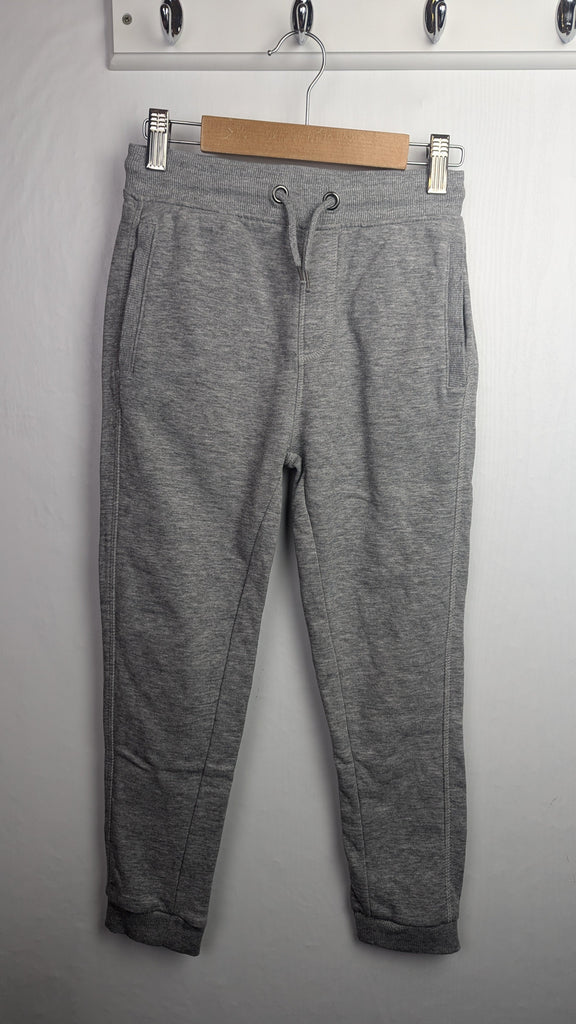 Nutmeg Grey Jogging Bottoms - Unisex 8-9 Years Little Ones Preloved Used, Preloved, Preworn & Second Hand Baby, Kids & Children's Clothing UK Online. Cheap affordable. Brands including Next, Joules, Nutmeg Morrisons, TU, F&F, H&M.