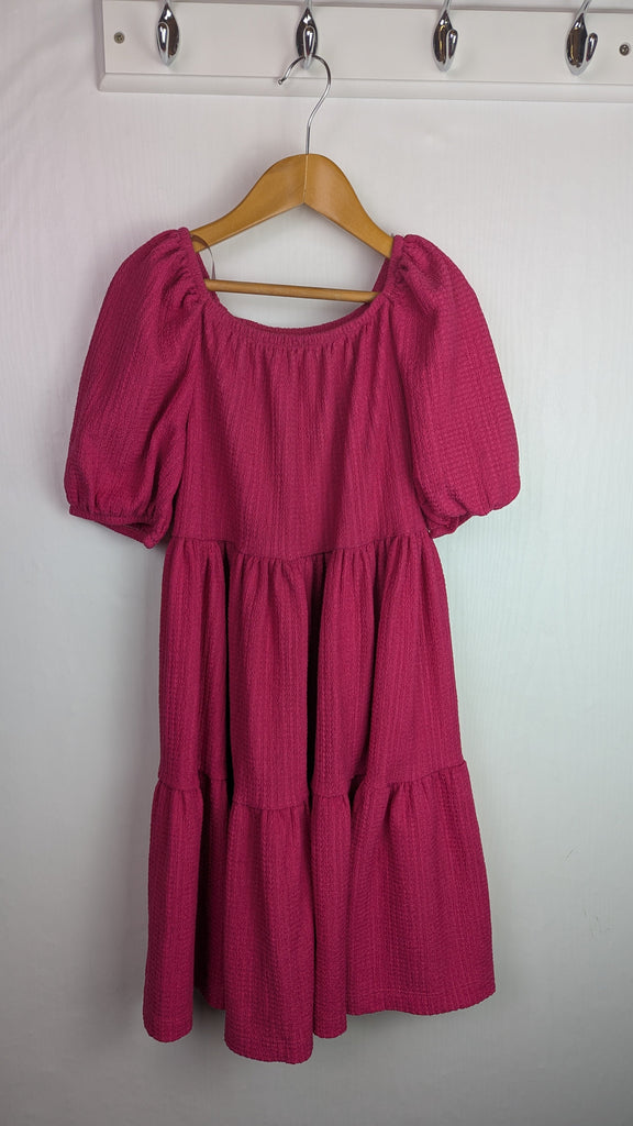 Nutmeg Pink Tiered Dress - Girls 8-9 Years Little Ones Preloved Used, Preloved, Preworn Baby, Girls & Boys Clothes. Kids & Children's second hand Clothing UK Online. Cheap affordable. Brands including Next, Joules, Nutmeg Morrisons, TU, F&F, H&M.