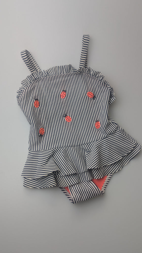 Nutmeg Striped Ladybird Swimsuit - Girls 2-3 Years Little Ones Preloved Used, Preloved, Preworn Baby, Girls & Boys Clothes. Kids & Children's second hand Clothing UK Online. Cheap affordable. Brands including Next, Joules, Nutmeg Morrisons, TU, F&F, H&M.