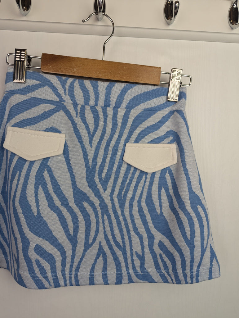 NWOT's Blue Animal Print Skirt - Girls 5-6 Years Little Ones Preloved Used, Preloved, Preworn Baby, Girls & Boys Clothes. Kids & Children's second hand Clothing UK Online. Cheap affordable. Brands including Next, Joules, Nutmeg Morrisons, TU, F&F, H&M.