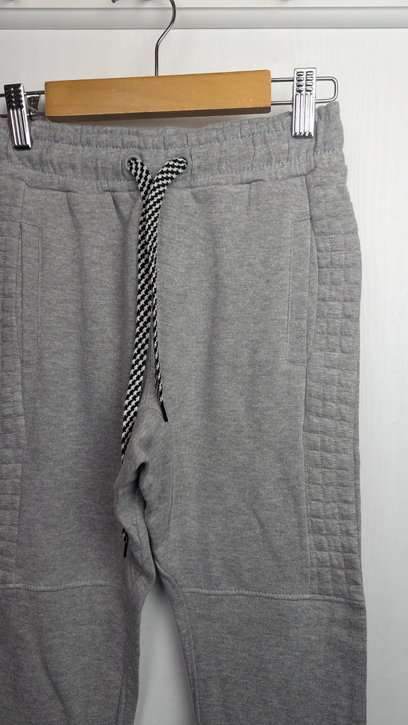 NWOT's Little Kids Grey Jogging Bottoms - Boys 7-8 Years Little Ones Preloved Used, Preloved, Preworn Baby, Girls & Boys Clothes. Kids & Children's second hand Clothing UK Online. Cheap affordable. Brands including Next, Joules, Nutmeg Morrisons, TU, F&F, H&M.