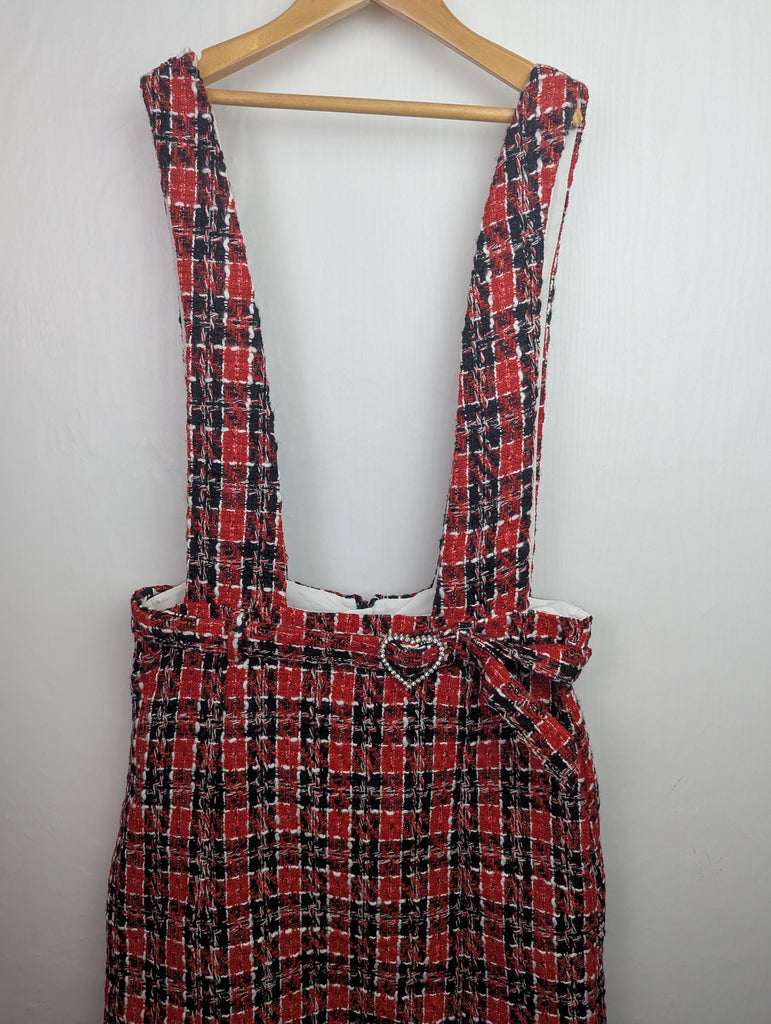 NWOT's Red Checked Knit Skirt - Girls 13-14 Years Little Ones Preloved Used, Preloved, Preworn Baby, Girls & Boys Clothes. Kids & Children's second hand Clothing UK Online. Cheap affordable. Brands including Next, Joules, Nutmeg Morrisons, TU, F&F, H&M.