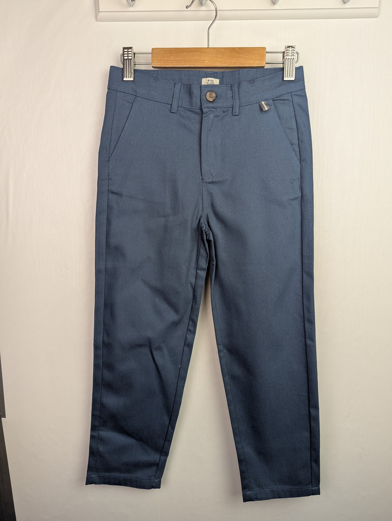NWOT's River Island Blue Trousers - Boys 5-6 Years Little Ones Preloved Used, Preloved, Preworn Baby, Girls & Boys Clothes. Kids & Children's second hand Clothing UK Online. Cheap affordable. Brands including Next, Joules, Nutmeg Morrisons, TU, F&F, H&M.