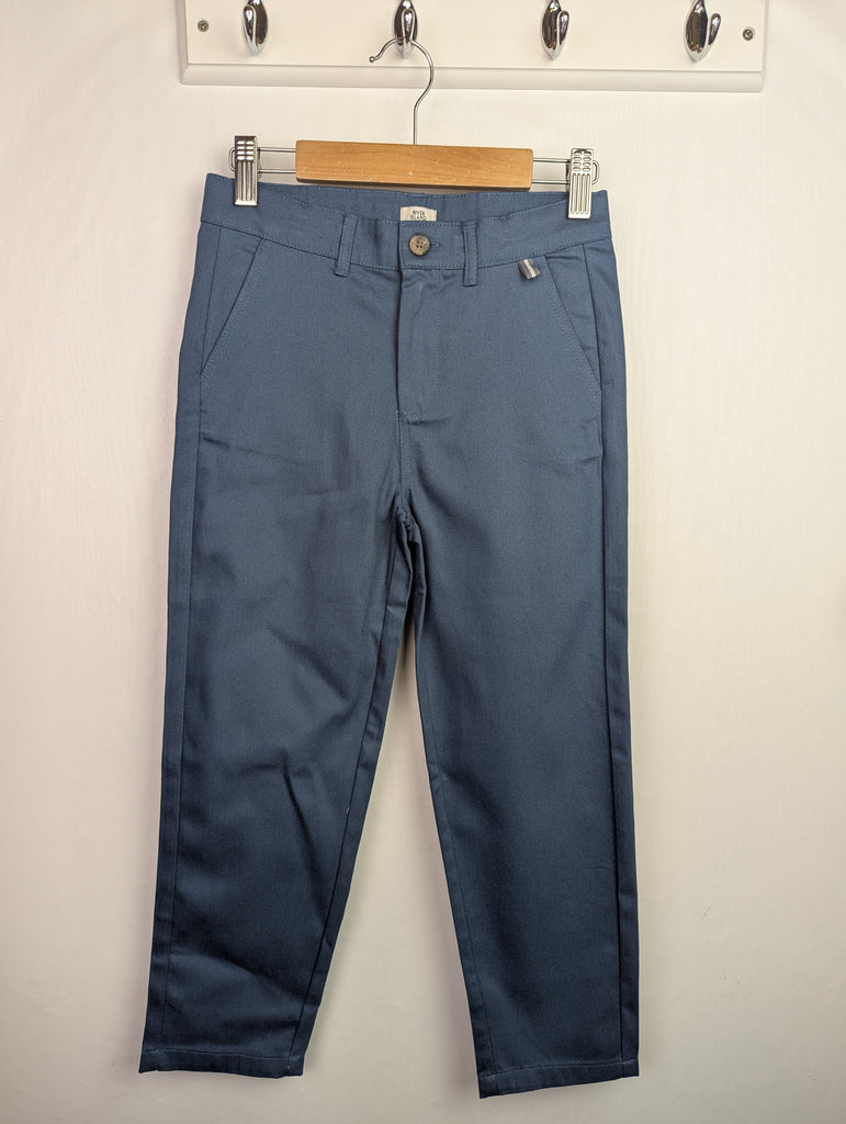 NWOT's River Island Blue Trousers - Boys 5-6 Years Little Ones Preloved Used, Preloved, Preworn Baby, Girls & Boys Clothes. Kids & Children's second hand Clothing UK Online. Cheap affordable. Brands including Next, Joules, Nutmeg Morrisons, TU, F&F, H&M.