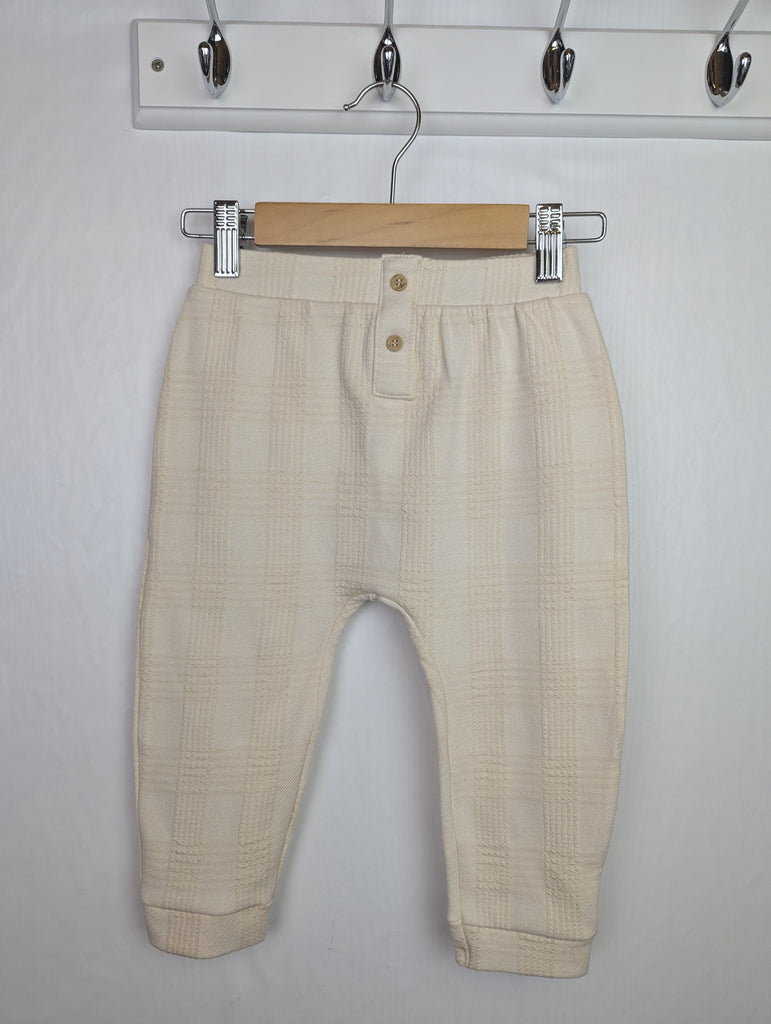 NWOT's River Island Cream Joggers - Unisex 18-24 Months Little Ones Preloved Used, Preloved, Preworn Baby, Girls & Boys Clothes. Kids & Children's second hand Clothing UK Online. Cheap affordable. Brands including Next, Joules, Nutmeg Morrisons, TU, F&F, H&M.