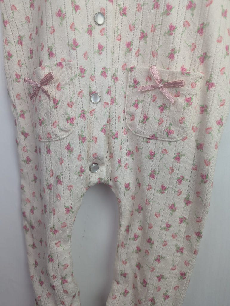 NWOT's River Island Floral Romper - Girls 9-12 Months Little Ones Preloved Used, Preloved, Preworn Baby, Girls & Boys Clothes. Kids & Children's second hand Clothing UK Online. Cheap affordable. Brands including Next, Joules, Nutmeg Morrisons, TU, F&F, H&M.