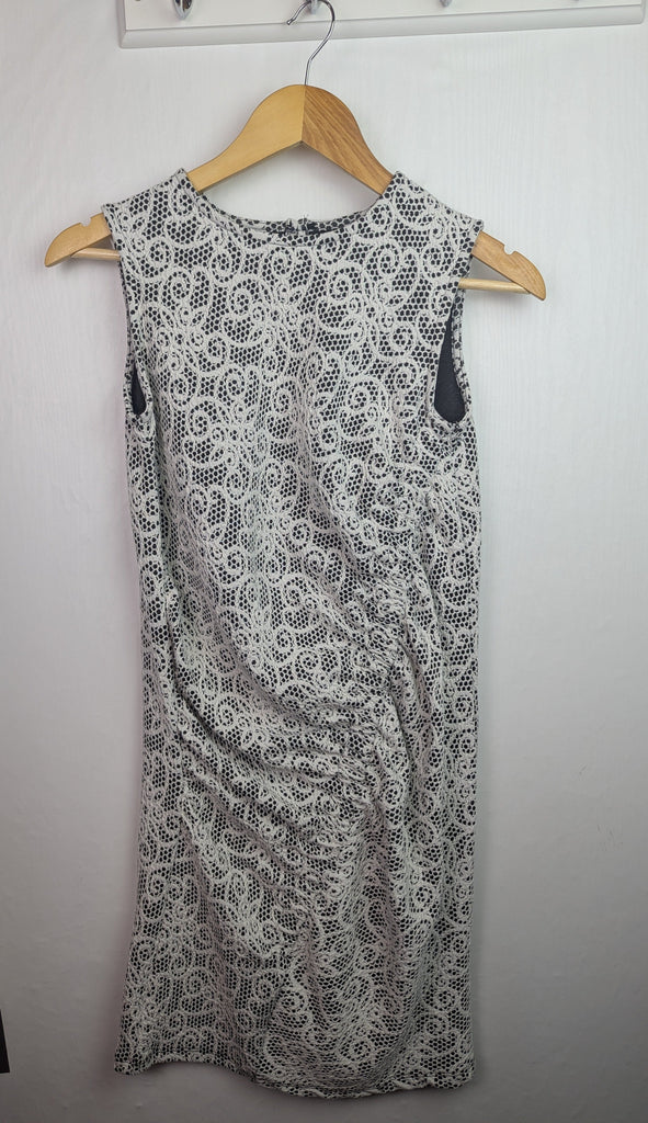 NWOT's River Island Floral Ruched Dress - Girls 13-14 Years Little Ones Preloved Used, Preloved, Preworn Baby, Girls & Boys Clothes. Kids & Children's second hand Clothing UK Online. Cheap affordable. Brands including Next, Joules, Nutmeg Morrisons, TU, F&F, H&M.