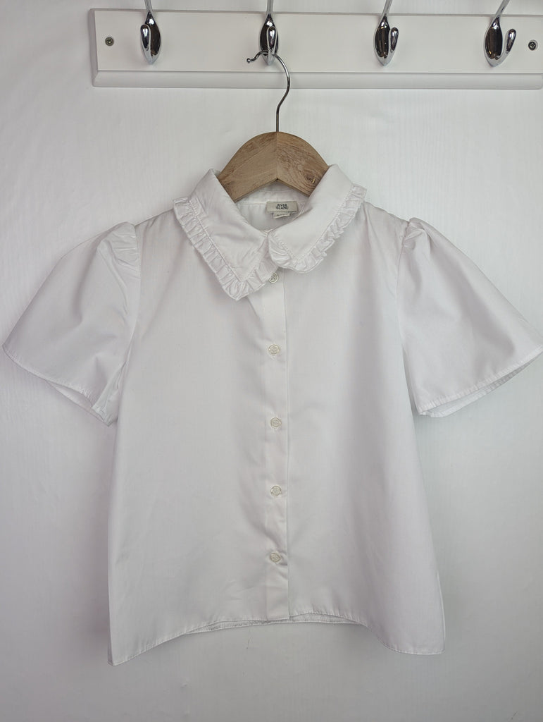 NWOT's River Island Frill Collar Shirt - Girls 7-8 Years Little Ones Preloved Used, Preloved, Preworn Baby, Girls & Boys Clothes. Kids & Children's second hand Clothing UK Online. Cheap affordable. Brands including Next, Joules, Nutmeg Morrisons, TU, F&F, H&M.
