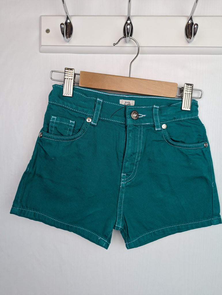 NWOT's River Island Green Denim Shorts - Girls 7-8 Years Little Ones Preloved Used, Preloved, Preworn Baby, Girls & Boys Clothes. Kids & Children's second hand Clothing UK Online. Cheap affordable. Brands including Next, Joules, Nutmeg Morrisons, TU, F&F, H&M.