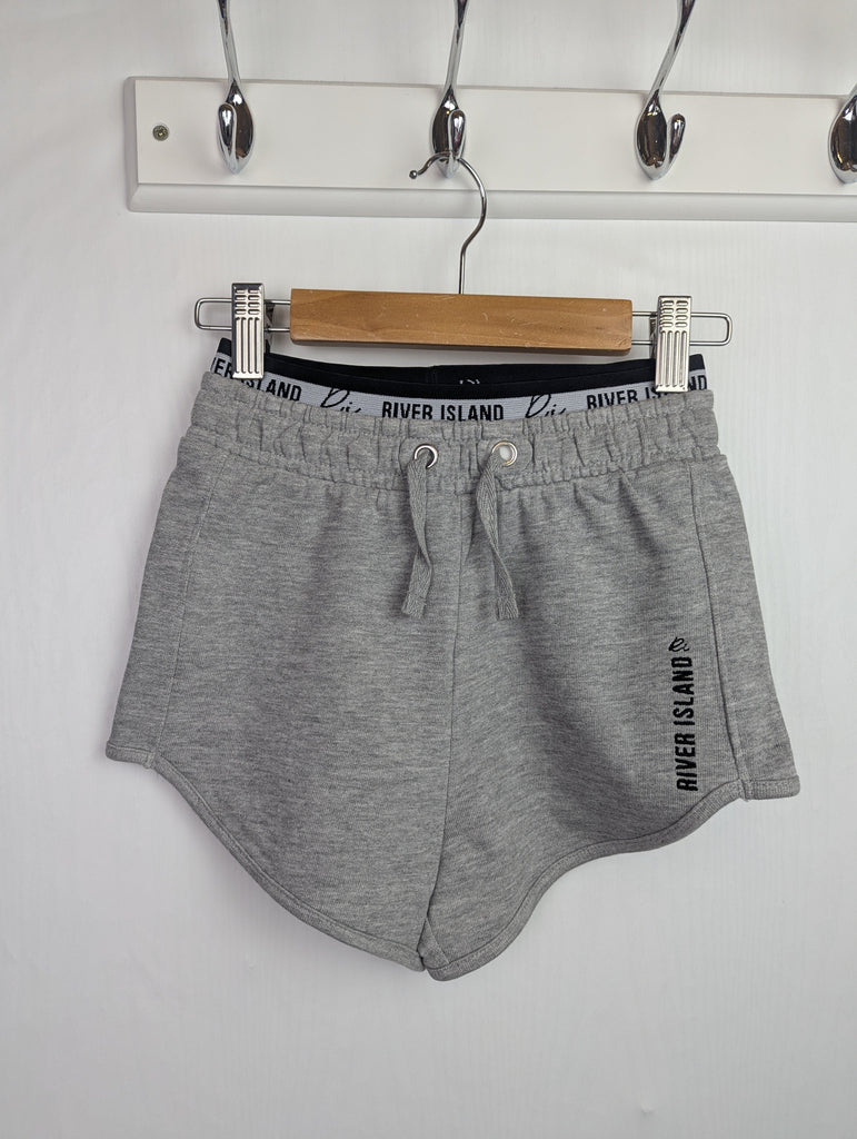 NWOT's River Island Grey Shorts - Girls 5-6 Years Little Ones Preloved Used, Preloved, Preworn Baby, Girls & Boys Clothes. Kids & Children's second hand Clothing UK Online. Cheap affordable. Brands including Next, Joules, Nutmeg Morrisons, TU, F&F, H&M.
