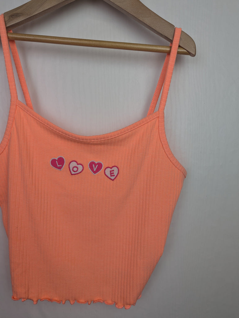 NWOT's River Island 'Love' Strap Top - Girls 15-16 Years Little Ones Preloved Used, Preloved, Preworn Baby, Girls & Boys Clothes. Kids & Children's second hand Clothing UK Online. Cheap affordable. Brands including Next, Joules, Nutmeg Morrisons, TU, F&F, H&M.