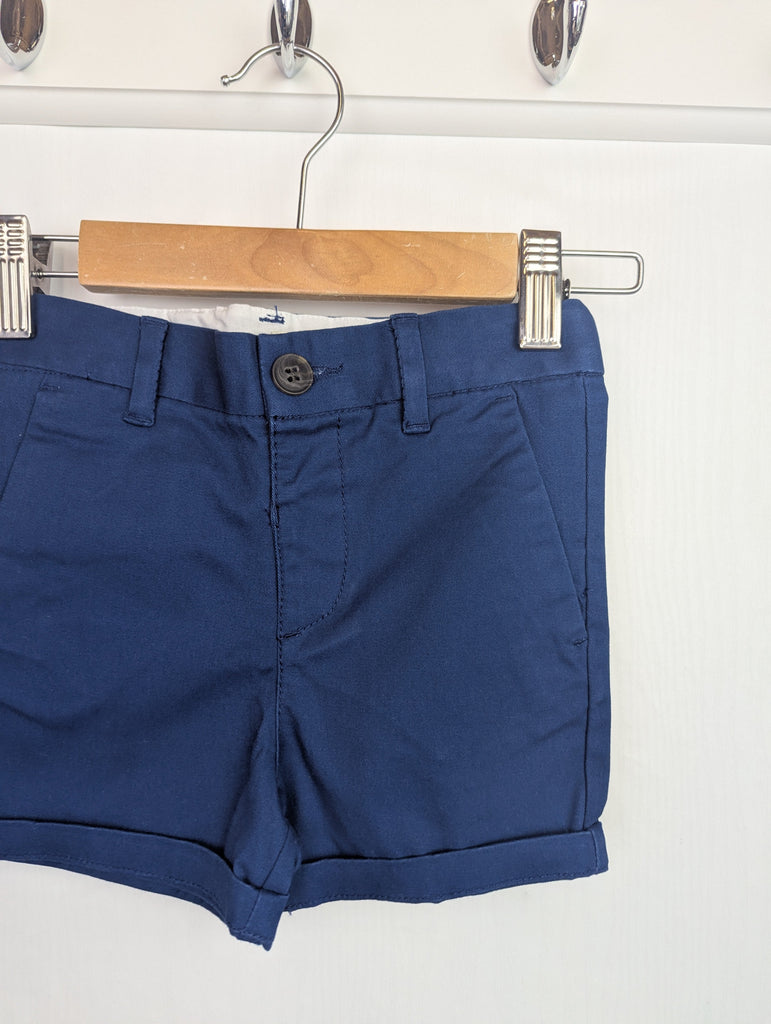 NWOT's River Island Navy Chino Shorts - Boys 18-24 Months Little Ones Preloved Used, Preloved, Preworn Baby, Girls & Boys Clothes. Kids & Children's second hand Clothing UK Online. Cheap affordable. Brands including Next, Joules, Nutmeg Morrisons, TU, F&F, H&M.