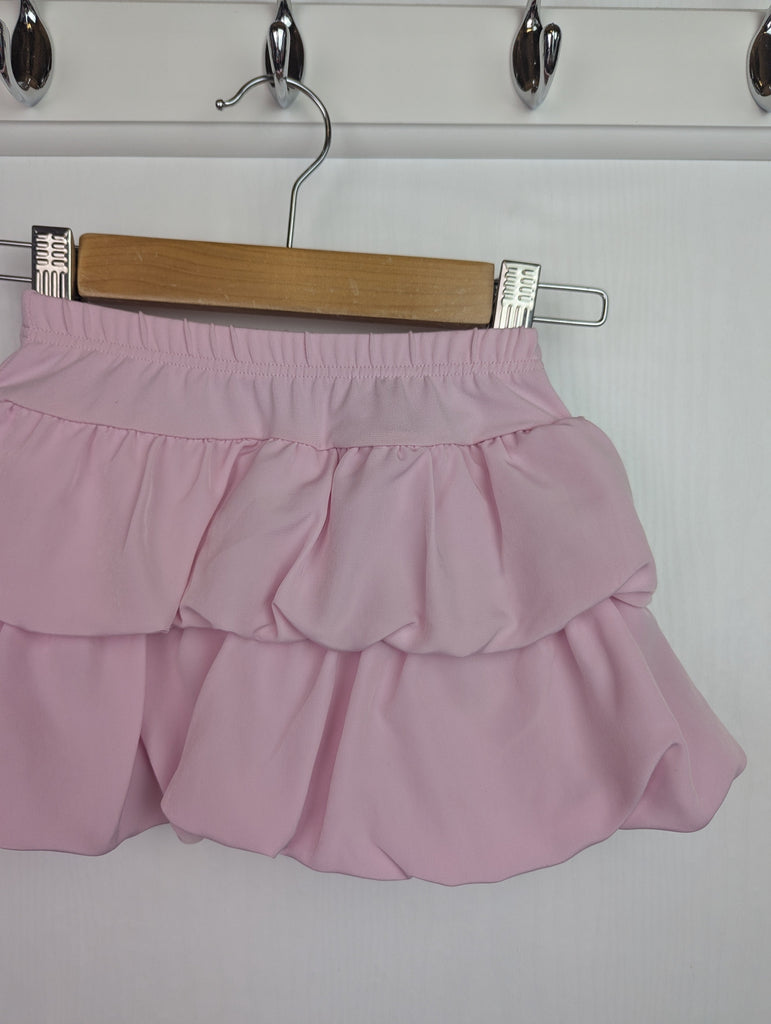 NWOT's River Island Pink Skirt - Girls 6-9 Months Little Ones Preloved Used, Preloved, Preworn Baby, Girls & Boys Clothes. Kids & Children's second hand Clothing UK Online. Cheap affordable. Brands including Next, Joules, Nutmeg Morrisons, TU, F&F, H&M.