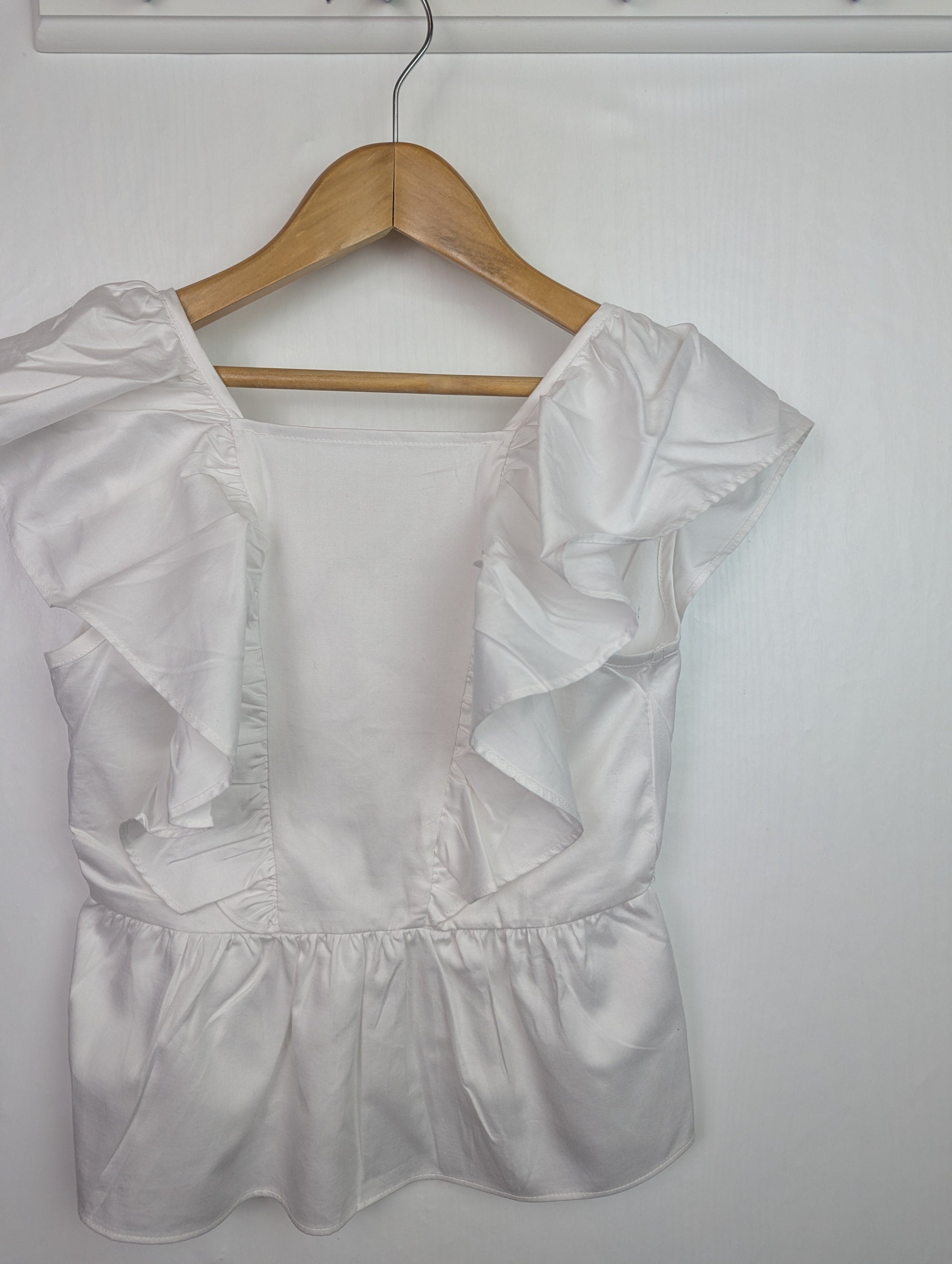 NWOT's River Island Ruffle Top - Girls 7 - 8 Years - Little Ones Preloved. Second Hand Children's & Preloved Baby, Kids, Girls & Boys Clothes. UK online