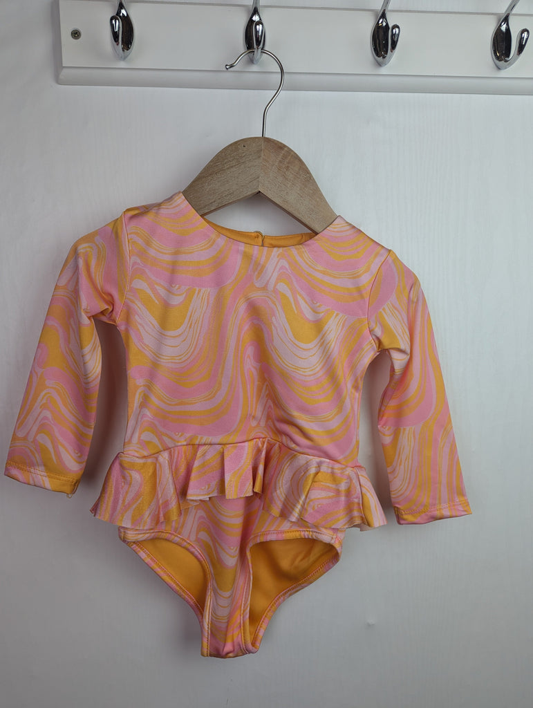 NWOT's River Island Swirl Swimsuit - Girls 18-24 Months Little Ones Preloved Used, Preloved, Preworn Baby, Girls & Boys Clothes. Kids & Children's second hand Clothing UK Online. Cheap affordable. Brands including Next, Joules, Nutmeg Morrisons, TU, F&F, H&M.