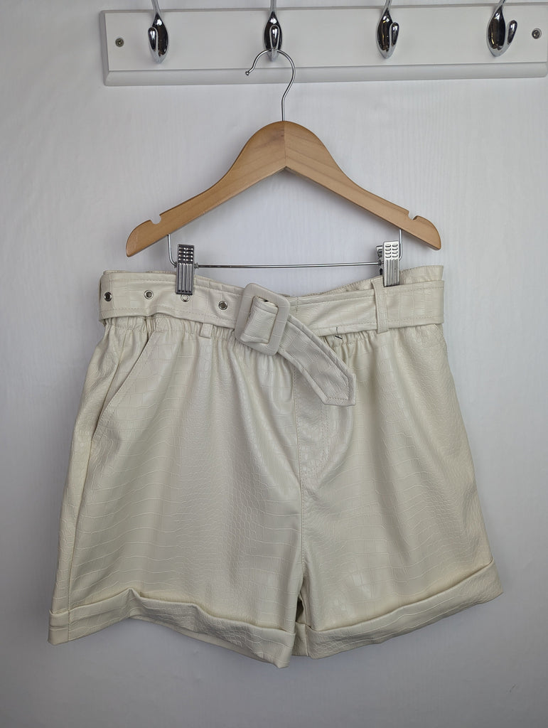 NWOT's River Island Pleather Shorts - Girls 11-12 Years Little Ones Preloved Used, Preloved, Preworn Baby, Girls & Boys Clothes. Kids & Children's second hand Clothing UK Online. Cheap affordable. Brands including Next, Joules, Nutmeg Morrisons, TU, F&F, H&M.