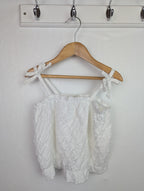 NWOT's River Island White Strap Top - Girls 4 - 5 Years - Little Ones Preloved. Second Hand Children's & Preloved Baby, Kids, Girls & Boys Clothes. UK online