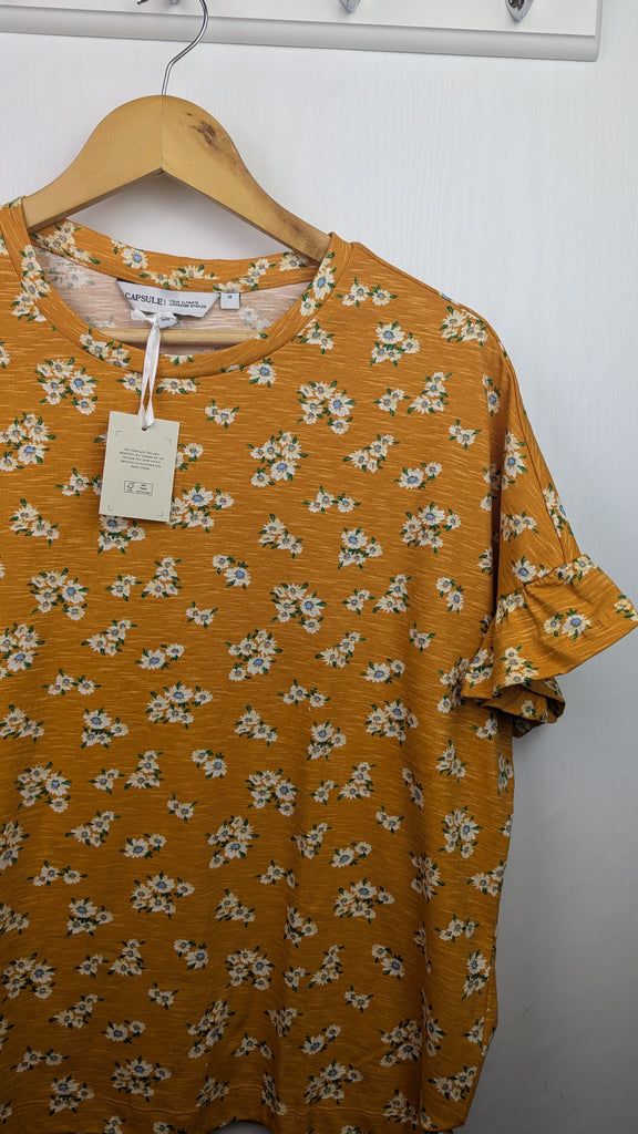 NWT's Capsule Mustard Floral Top - Ladies Size 12 Little Ones Preloved Used, Preloved, Preworn & Second Hand Baby, Kids & Children's Clothing UK Online. Cheap affordable. Brands including Next, Joules, Nutmeg Morrisons, TU, F&F, H&M.