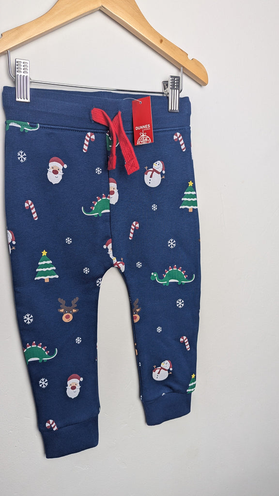 NWT's Dunnes Navy Christmas Jogging Bottoms - Boys 18-23 Months Little Ones Preloved Used, Preloved, Preworn & Second Hand Baby, Kids & Children's Clothing UK Online. Cheap affordable. Brands including Next, Joules, Nutmeg Morrisons, TU, F&F, H&M.