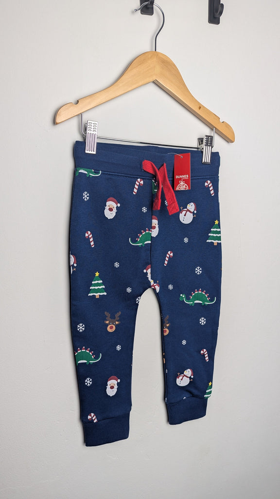 NWT's Dunnes Navy Christmas Jogging Bottoms - Boys 18-23 Months Little Ones Preloved Used, Preloved, Preworn Baby, Girls & Boys Clothes. Kids & Children's second hand Clothing UK Online. Cheap affordable. Brands including Next, Joules, Nutmeg Morrisons, TU, F&F, H&M.