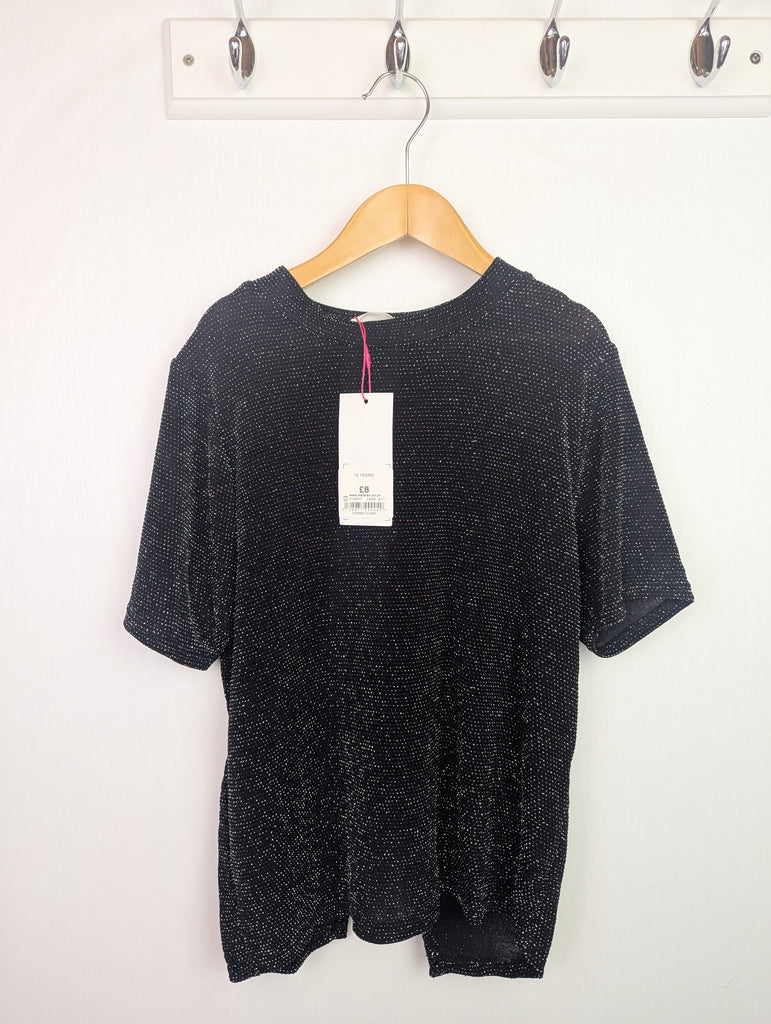 NWT's Matalan Black Top - Girls 12 Years Little Ones Preloved Used, Preloved, Preworn Baby, Girls & Boys Clothes. Kids & Children's second hand Clothing UK Online. Cheap affordable. Brands including Next, Joules, Nutmeg Morrisons, TU, F&F, H&M.