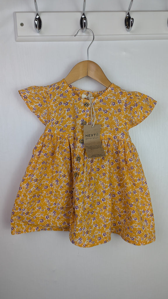 NWT's Next Mustard Floral Dress - Girls 6-9 Months Little Ones Preloved Used, Preloved, Preworn Baby, Girls & Boys Clothes. Kids & Children's second hand Clothing UK Online. Cheap affordable. Brands including Next, Joules, Nutmeg Morrisons, TU, F&F, H&M.