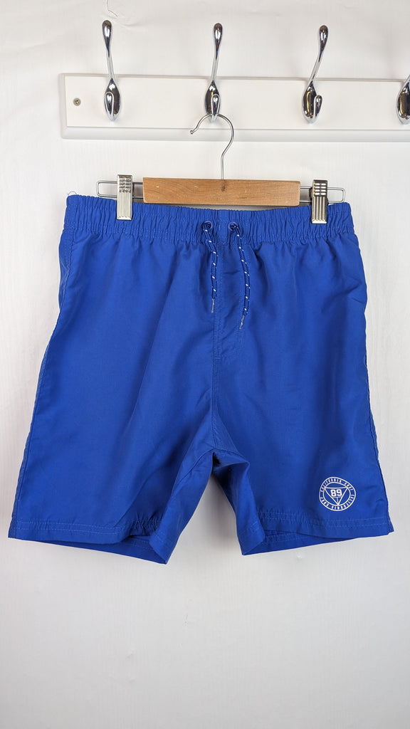 Pep & Co Blue Swim Shorts - Boys 12-13 Years Little Ones Preloved Used, Preloved, Preworn Baby, Girls & Boys Clothes. Kids & Children's second hand Clothing UK Online. Cheap affordable. Brands including Next, Joules, Nutmeg Morrisons, TU, F&F, H&M.