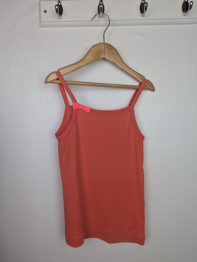 Petit Bateau Bow Vest Top - Girls 10 Years Little Ones Preloved Used, Preloved, Preworn Baby, Girls & Boys Clothes. Kids & Children's second hand Clothing UK Online. Cheap affordable. Brands including Next, Joules, Nutmeg Morrisons, TU, F&F, H&M.