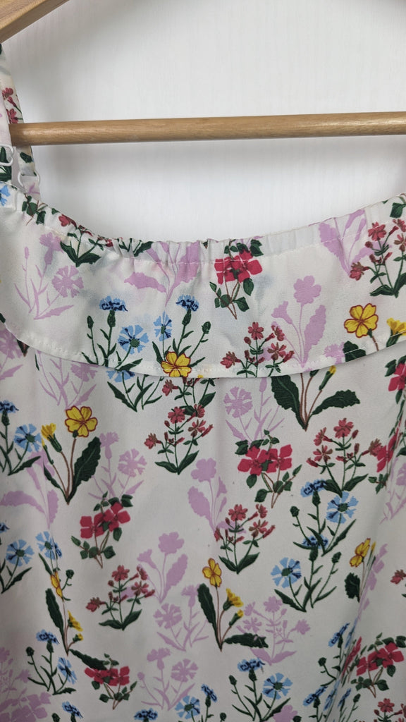 PLAYWEAR New Look Off Shoulder Floral Top - Girls 13 Years New Look Used, Preloved, Preworn & Second Hand Baby, Kids & Children's Clothing UK Online. Cheap affordable. Brands including Next, Joules, Nutmeg Morrisons, TU, F&F, H&M.