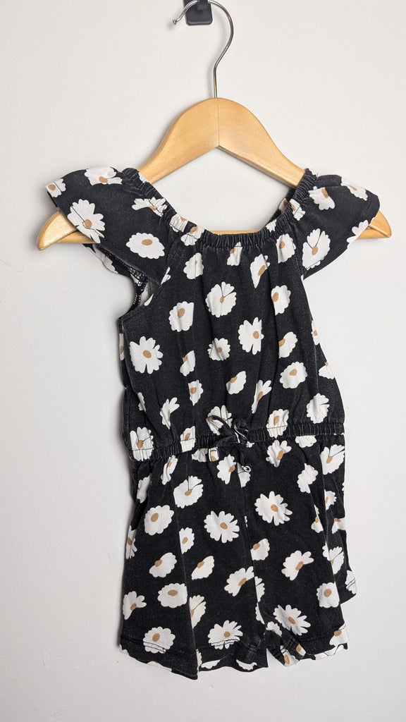 Primark Black Floral Playsuit - Girls 18-24 Months Little Ones Preloved Used, Preloved, Preworn & Second Hand Baby, Kids & Children's Clothing UK Online. Cheap affordable. Brands including Next, Joules, Nutmeg Morrisons, TU, F&F, H&M.