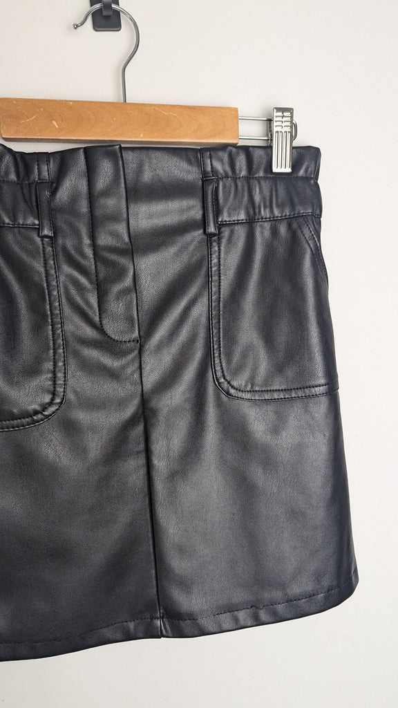 Primark Black Pleather Skirt - Girls 10-11 Years Little Ones Preloved Used, Preloved, Preworn Baby, Girls & Boys Clothes. Kids & Children's second hand Clothing UK Online. Cheap affordable. Brands including Next, Joules, Nutmeg Morrisons, TU, F&F, H&M.