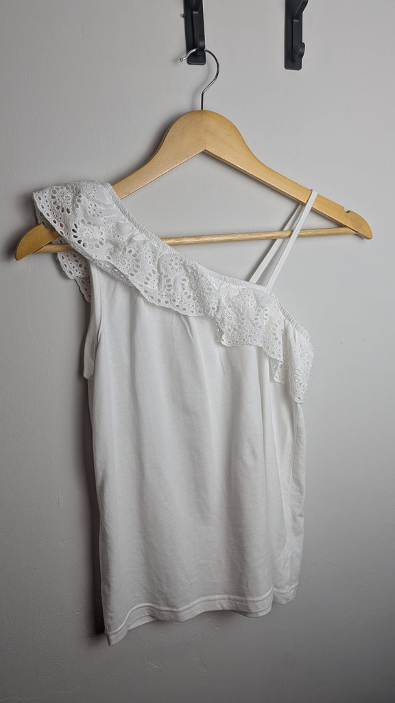 Primark White Eyelet Cold Shoulder Top - Girls 12-13 Years Little Ones Preloved Used, Preloved, Preworn Baby, Girls & Boys Clothes. Kids & Children's second hand Clothing UK Online. Cheap affordable. Brands including Next, Joules, Nutmeg Morrisons, TU, F&F, H&M.