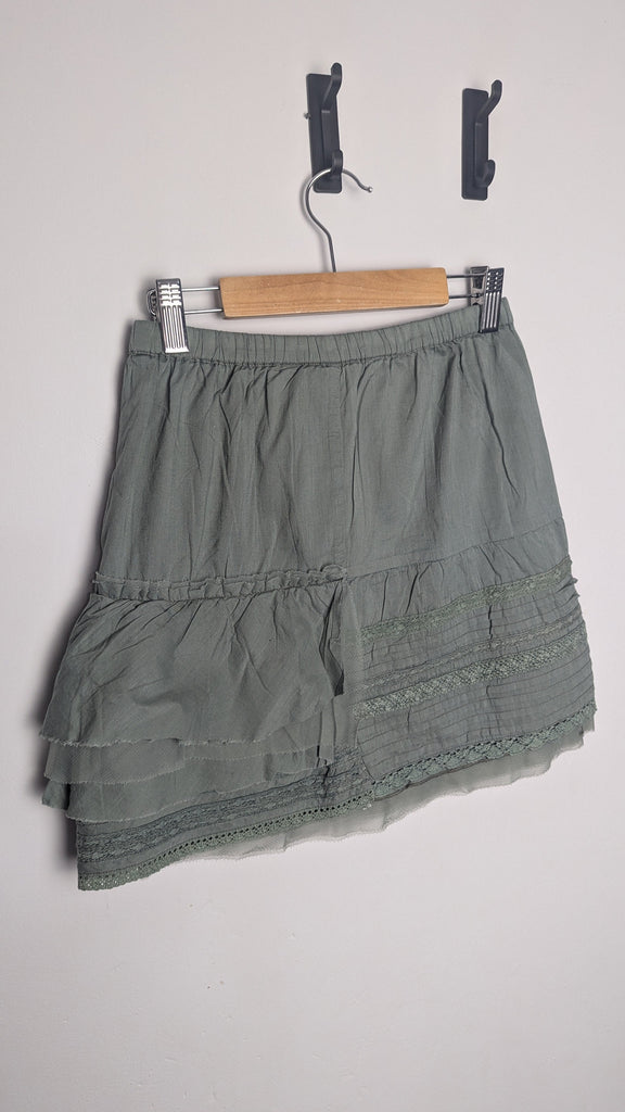 R Ninety Fifth Khaki Green Skirt - Girls 10 Years Little Ones Preloved Used, Preloved, Preworn Baby, Girls & Boys Clothes. Kids & Children's second hand Clothing UK Online. Cheap affordable. Brands including Next, Joules, Nutmeg Morrisons, TU, F&F, H&M.