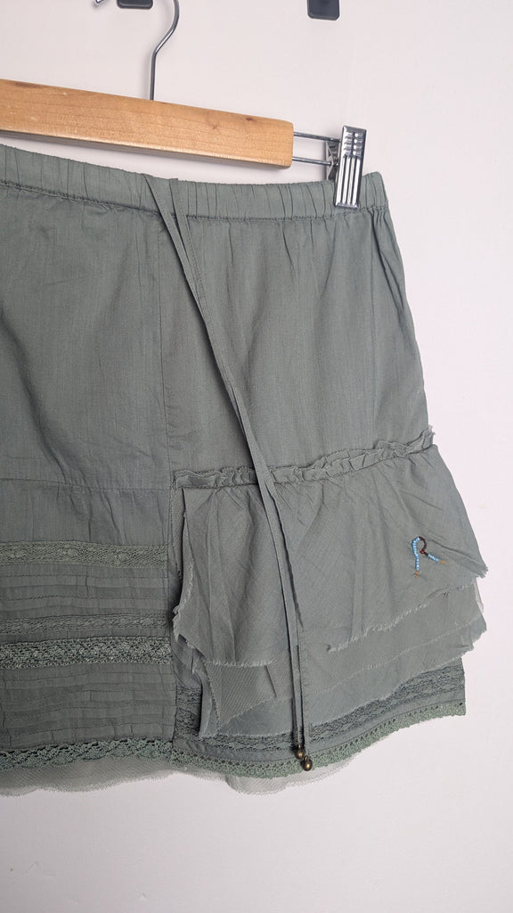 R Ninety Fifth Khaki Green Skirt - Girls 10 Years Little Ones Preloved Used, Preloved, Preworn Baby, Girls & Boys Clothes. Kids & Children's second hand Clothing UK Online. Cheap affordable. Brands including Next, Joules, Nutmeg Morrisons, TU, F&F, H&M.