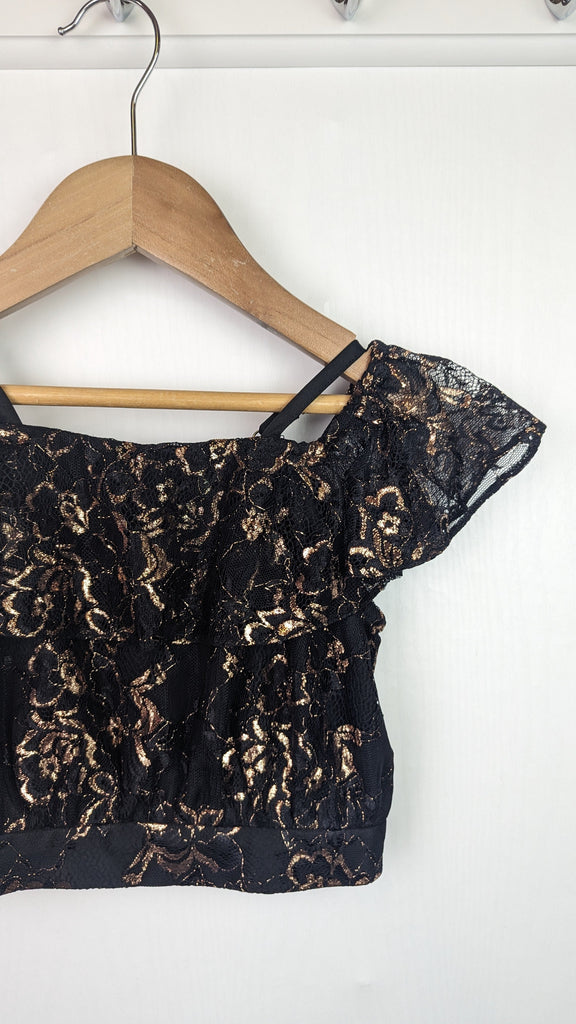 River Island Black & Gold Crop Top - Girls 6 Years River Island Used, Preloved, Preworn Baby, Girls & Boys Clothes. Kids & Children's second hand Clothing UK Online. Cheap affordable. Brands including Next, Joules, Nutmeg Morrisons, TU, F&F, H&M.