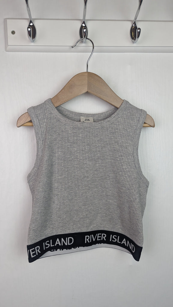 River Island Grey Ribbed Crop Top - Girls 9-10 Years River Island Used, Preloved, Preworn & Second Hand Baby, Kids & Children's Clothing UK Online. Cheap affordable. Brands including Next, Joules, Nutmeg Morrisons, TU, F&F, H&M.