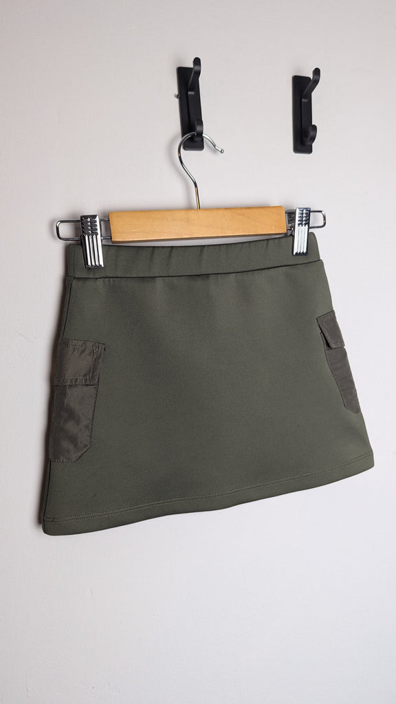 River Island Khaki Green Mini Skirt - Girls 2-3 Years Little Ones Preloved Used, Preloved, Preworn & Second Hand Baby, Kids & Children's Clothing UK Online. Cheap affordable. Brands including Next, Joules, Nutmeg Morrisons, TU, F&F, H&M.