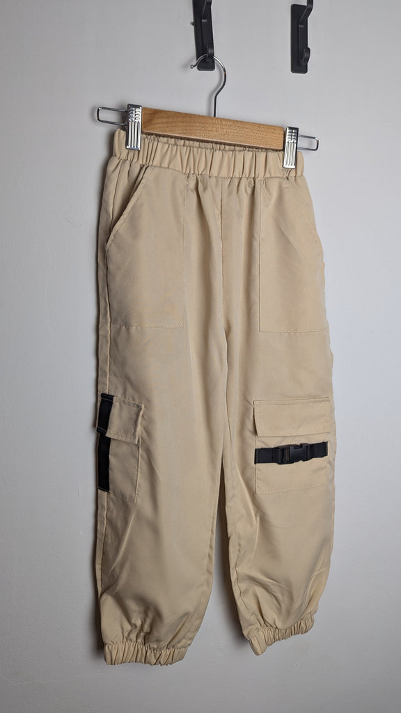 Shein Beige Cargo Trousers - Girls 6 Years Little Ones Preloved Used, Preloved, Preworn & Second Hand Baby, Kids & Children's Clothing UK Online. Cheap affordable. Brands including Next, Joules, Nutmeg Morrisons, TU, F&F, H&M.