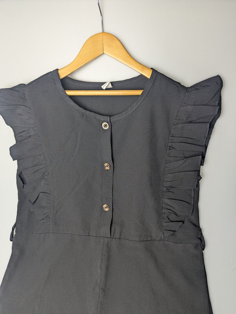 Shein Black Playsuit - Girls 11-12 Years Little Ones Preloved Used, Preloved, Preworn Baby, Girls & Boys Clothes. Kids & Children's second hand Clothing UK Online. Cheap affordable. Brands including Next, Joules, Nutmeg Morrisons, TU, F&F, H&M.