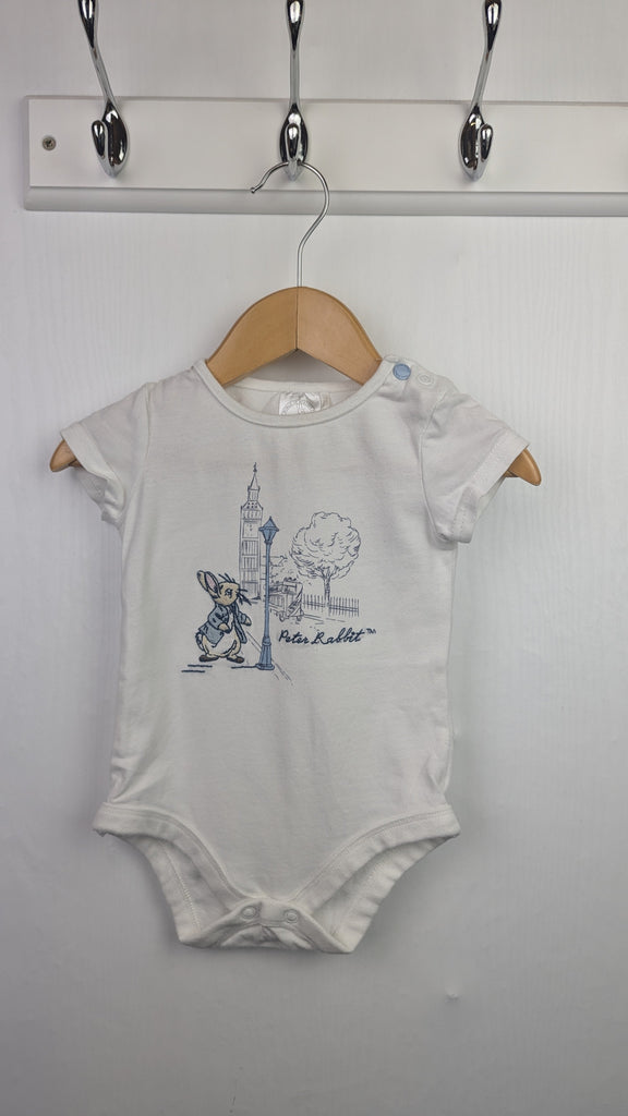 TU Peter Rabbit Bodysuit - Unisex 3-6 Months Little Ones Preloved Used, Preloved, Preworn & Second Hand Baby, Kids & Children's Clothing UK Online. Cheap affordable. Brands including Next, Joules, Nutmeg Morrisons, TU, F&F, H&M.