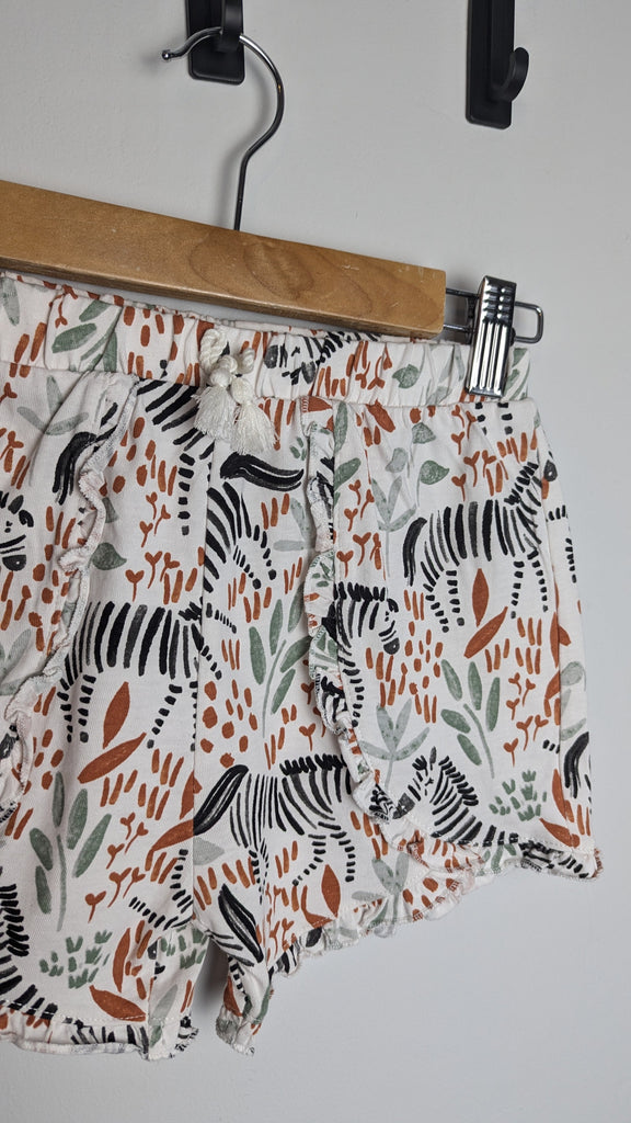 TU White Zebra Shorts - Girls 5-6 Years Little Ones Preloved Used, Preloved, Preworn & Second Hand Baby, Kids & Children's Clothing UK Online. Cheap affordable. Brands including Next, Joules, Nutmeg Morrisons, TU, F&F, H&M.