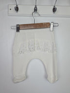 Unbranded Cream Eyelet Ruffle Leggings - Girls 0 - 3 Months - Little Ones Preloved. Second Hand Children's & Preloved Baby, Kids, Girls & Boys Clothes. UK online