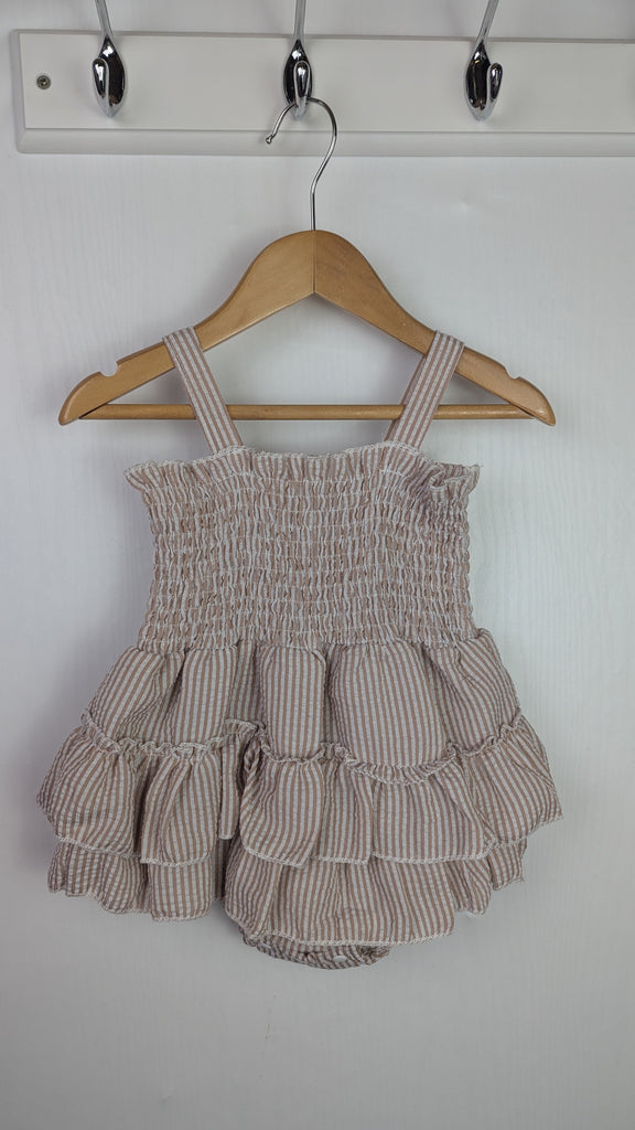 Unbranded Floral Striped Romper - Girls 6-9 Months Little Ones Preloved Used, Preloved, Preworn Baby, Girls & Boys Clothes. Kids & Children's second hand Clothing UK Online. Cheap affordable. Brands including Next, Joules, Nutmeg Morrisons, TU, F&F, H&M.