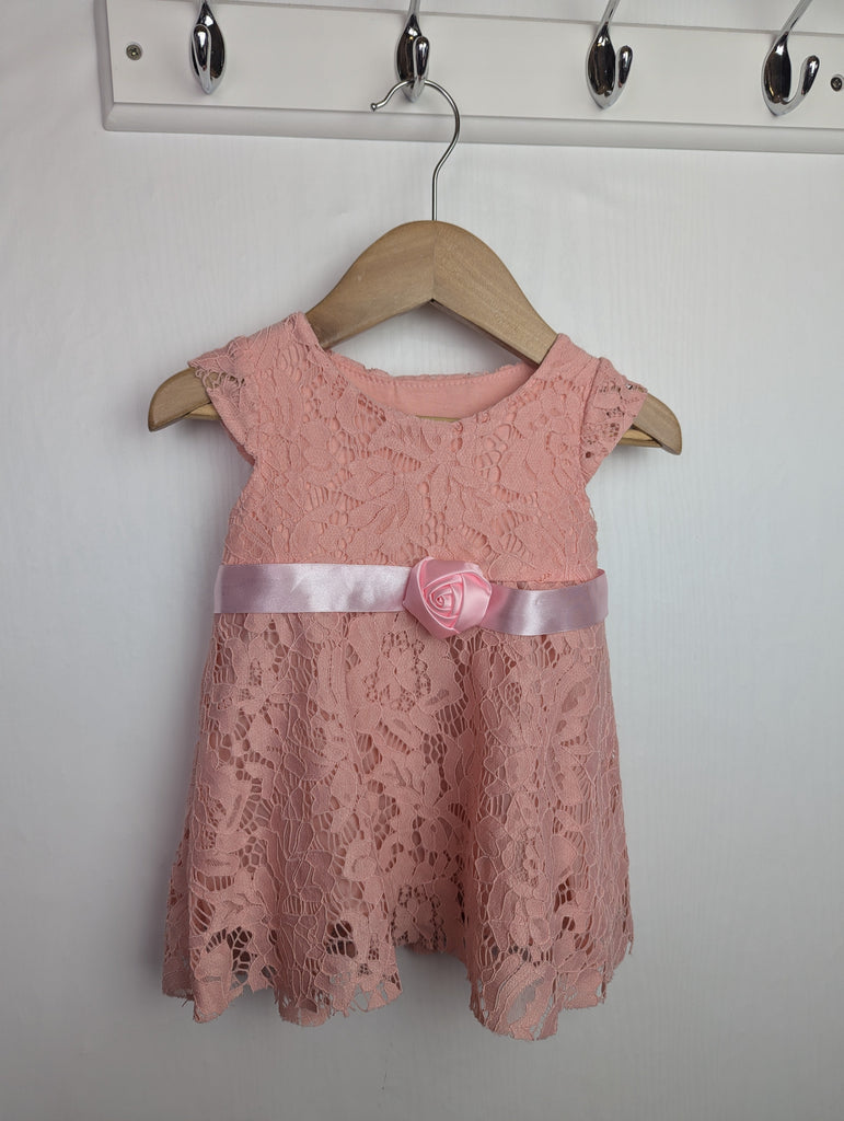 Unbranded Pink Floral Dress - Girls 9 Months Little Ones Preloved Used, Preloved, Preworn Baby, Girls & Boys Clothes. Kids & Children's second hand Clothing UK Online. Cheap affordable. Brands including Next, Joules, Nutmeg Morrisons, TU, F&F, H&M.